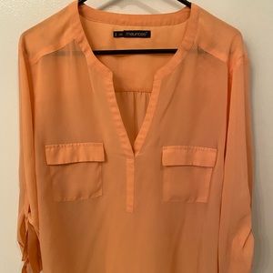 Orange v-neck sheer blouse